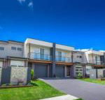 Escape at Nobbys Executive Townhouse 1 74 Pacific Drive - Accommodation Bookings