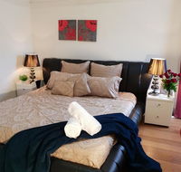 GIRLS ONLY. Large bedroom with KING bed close to everything