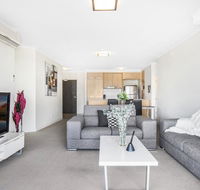 Lakeside Family Oasis with Pool Gym and Balcony - Accommodation Bookings