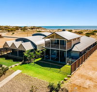 108 Madaffari Drive - Caretta - Luxurious Marina Home With A Spa and Free WiFi - Accommodation Bookings